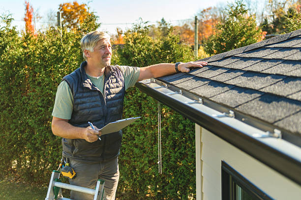 Professional Roofing technician working in Pine Ridge, SD